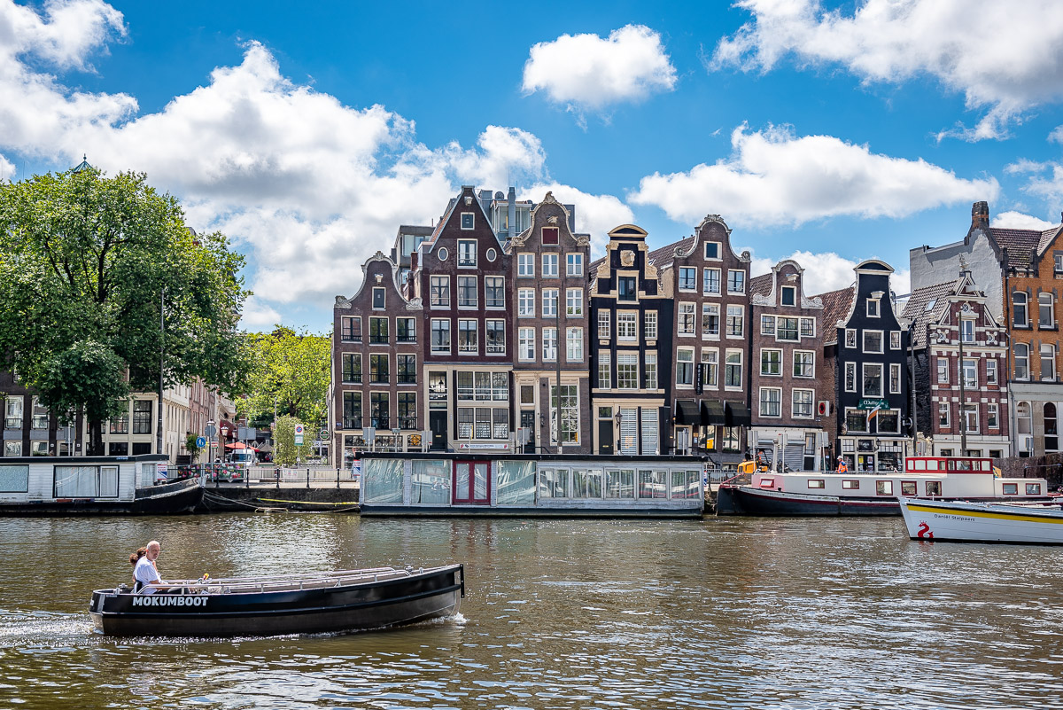 A boat passing through the canals of Amsterdam