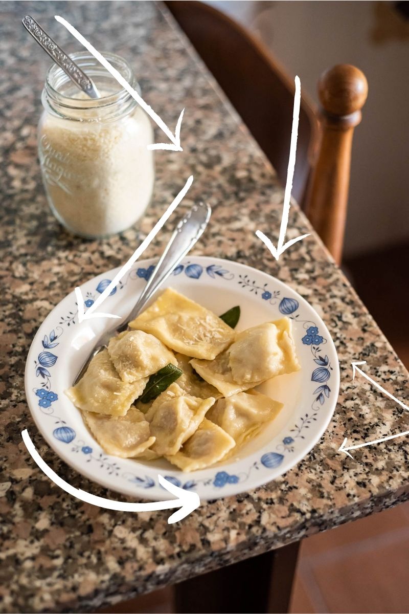 Example of leading lines in travel photography, ravioli with sage and butter