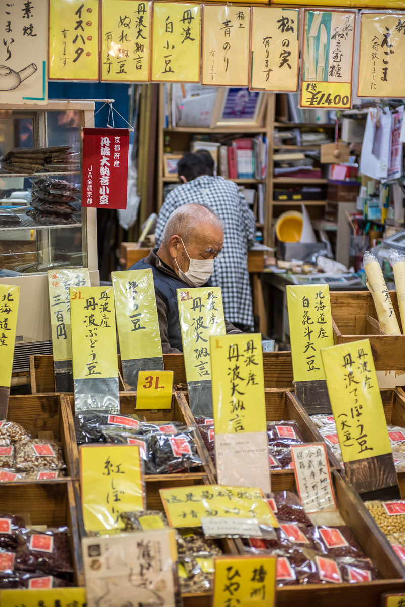 old man in his shop in Kyoto market