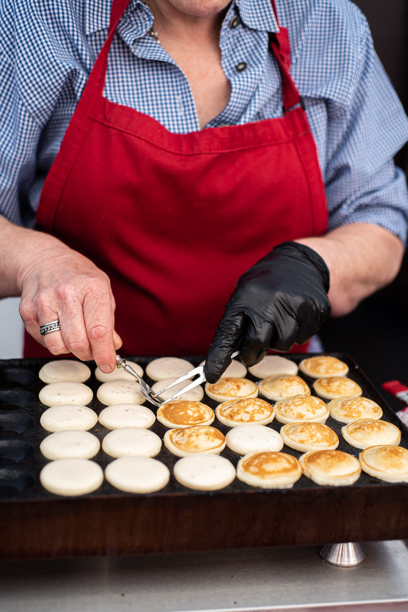 tips for street food photography - a vendor preparing Dutch pancakes