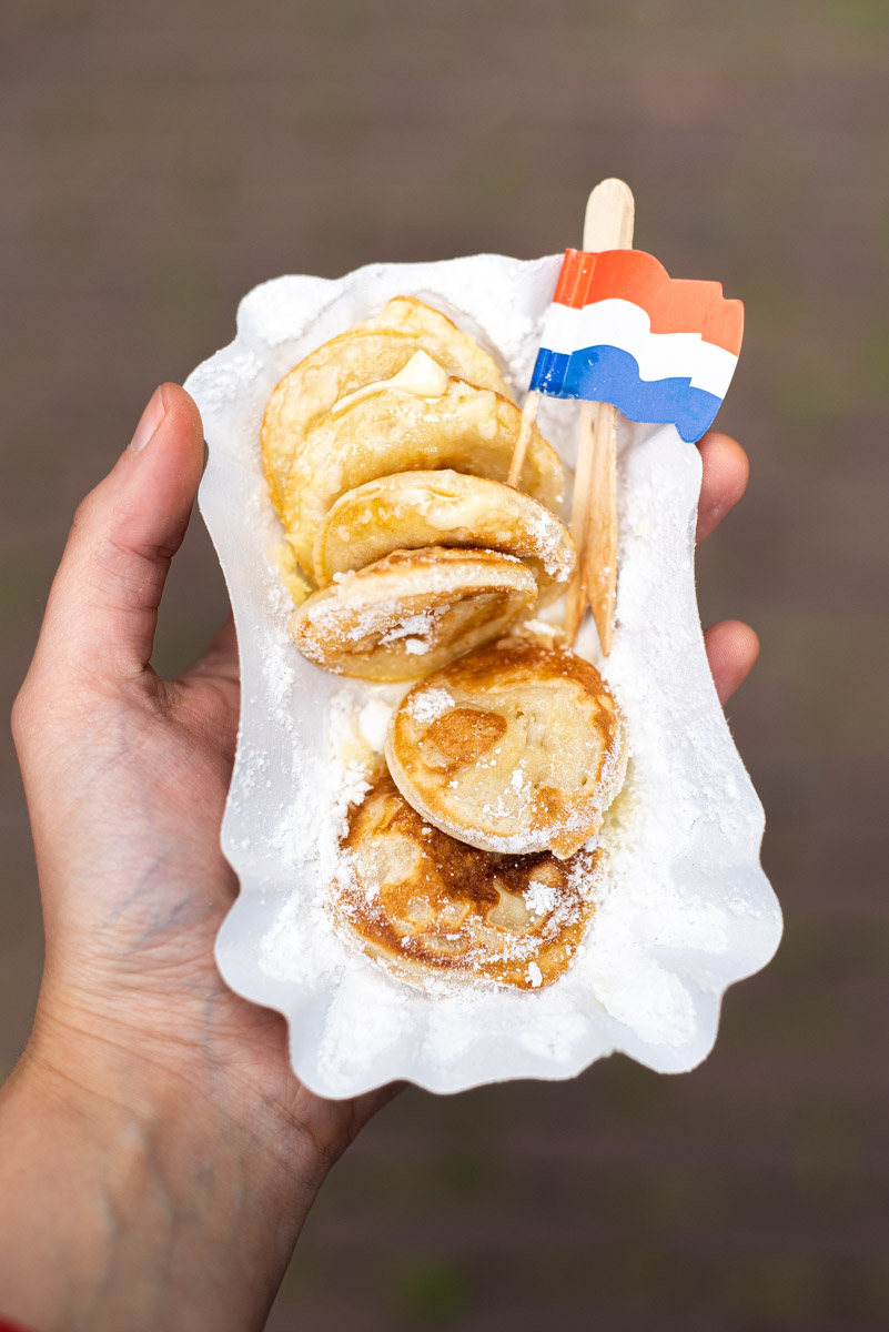 tips for street food photography - Dutch pancakes being eaten