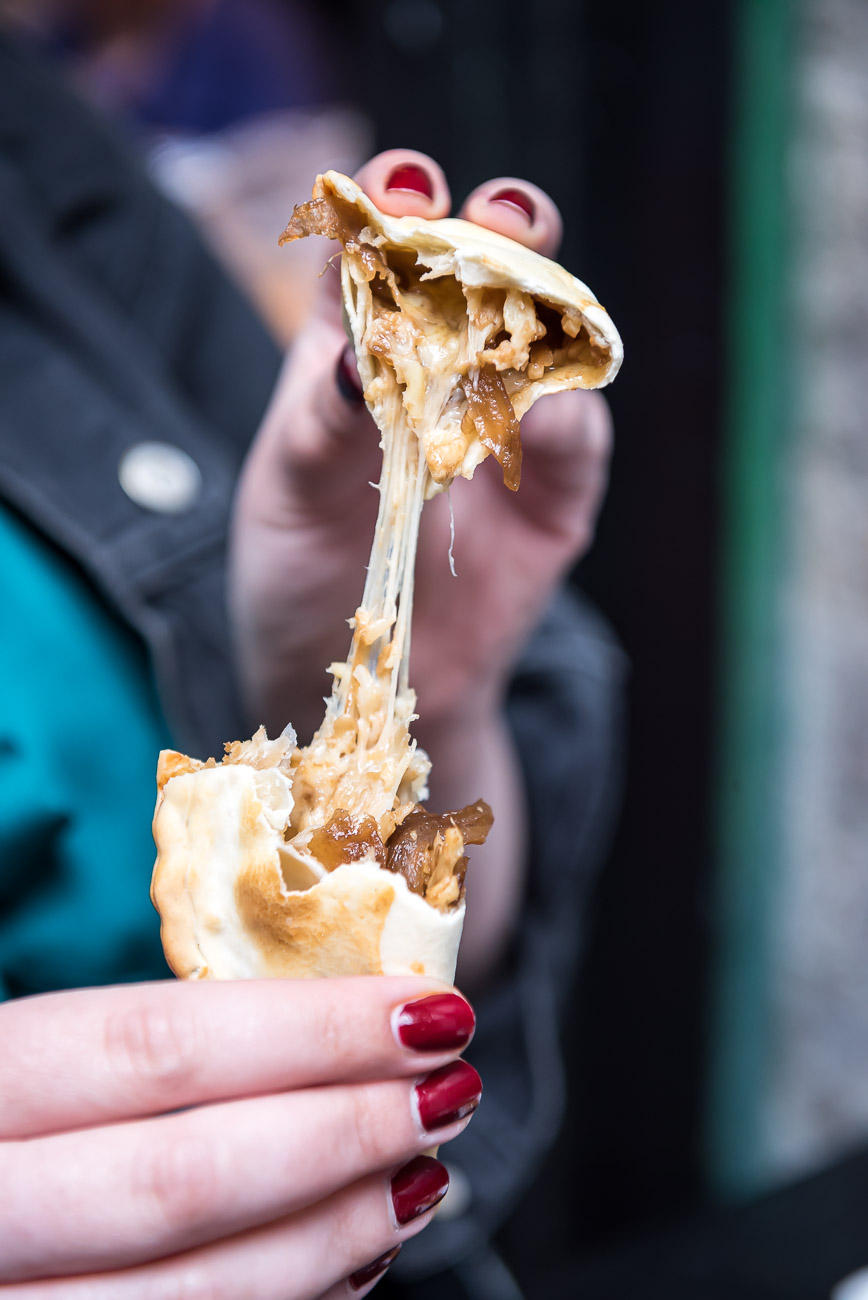 tips for street food photography - empanadas cheese pull
